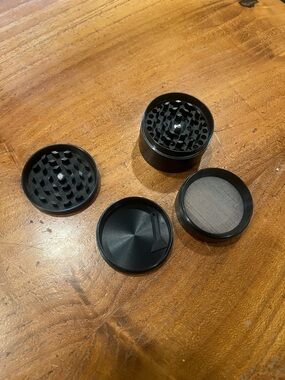 2” aluminum cannabis/ herb grinder and a smell proof 6”x4” pouch